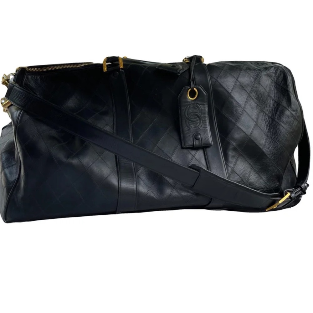 CHANEL LEATHER TRAVEL BAG!!